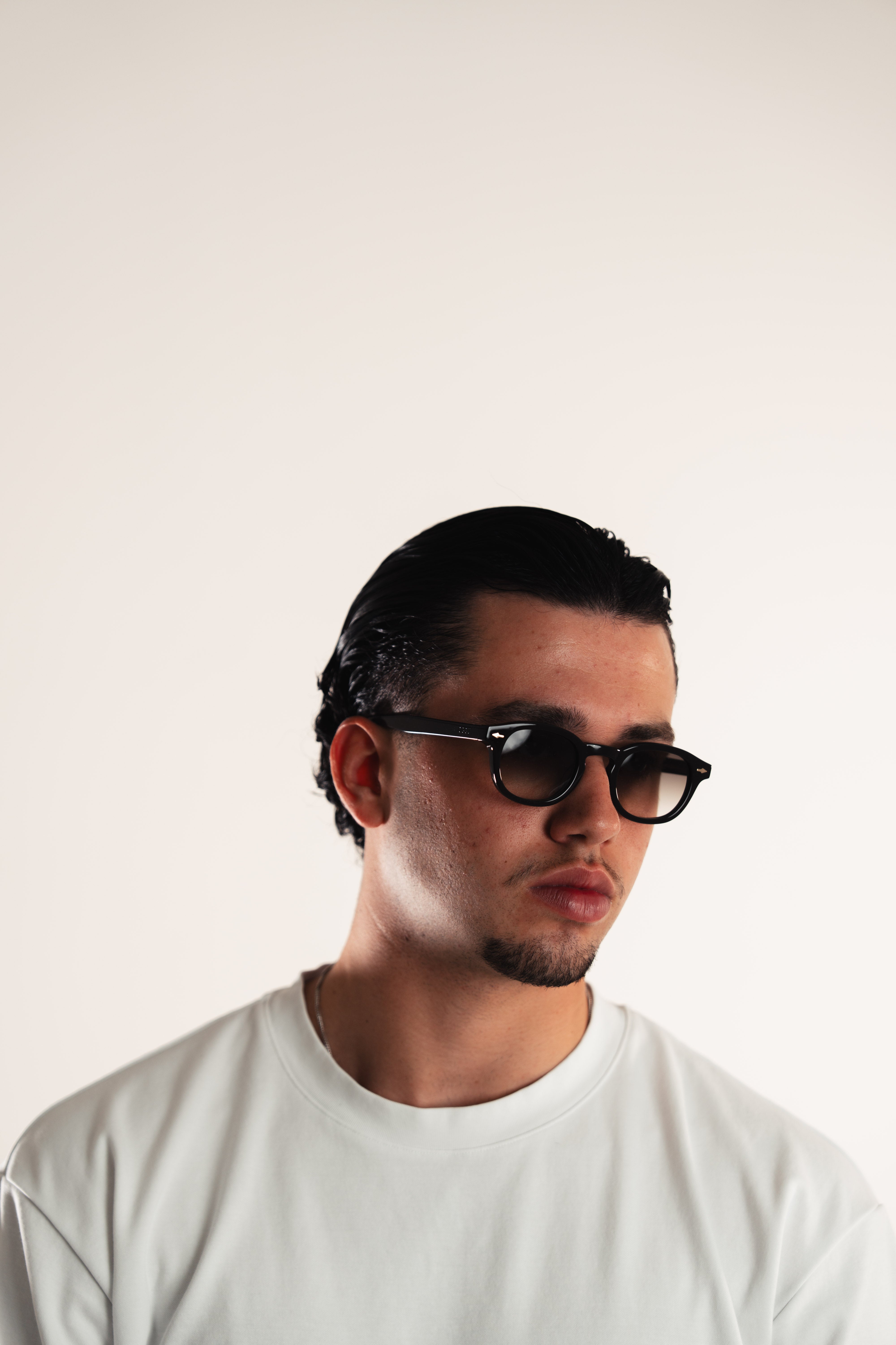 Rune II OCCU lifestyle shot black green sunglasses