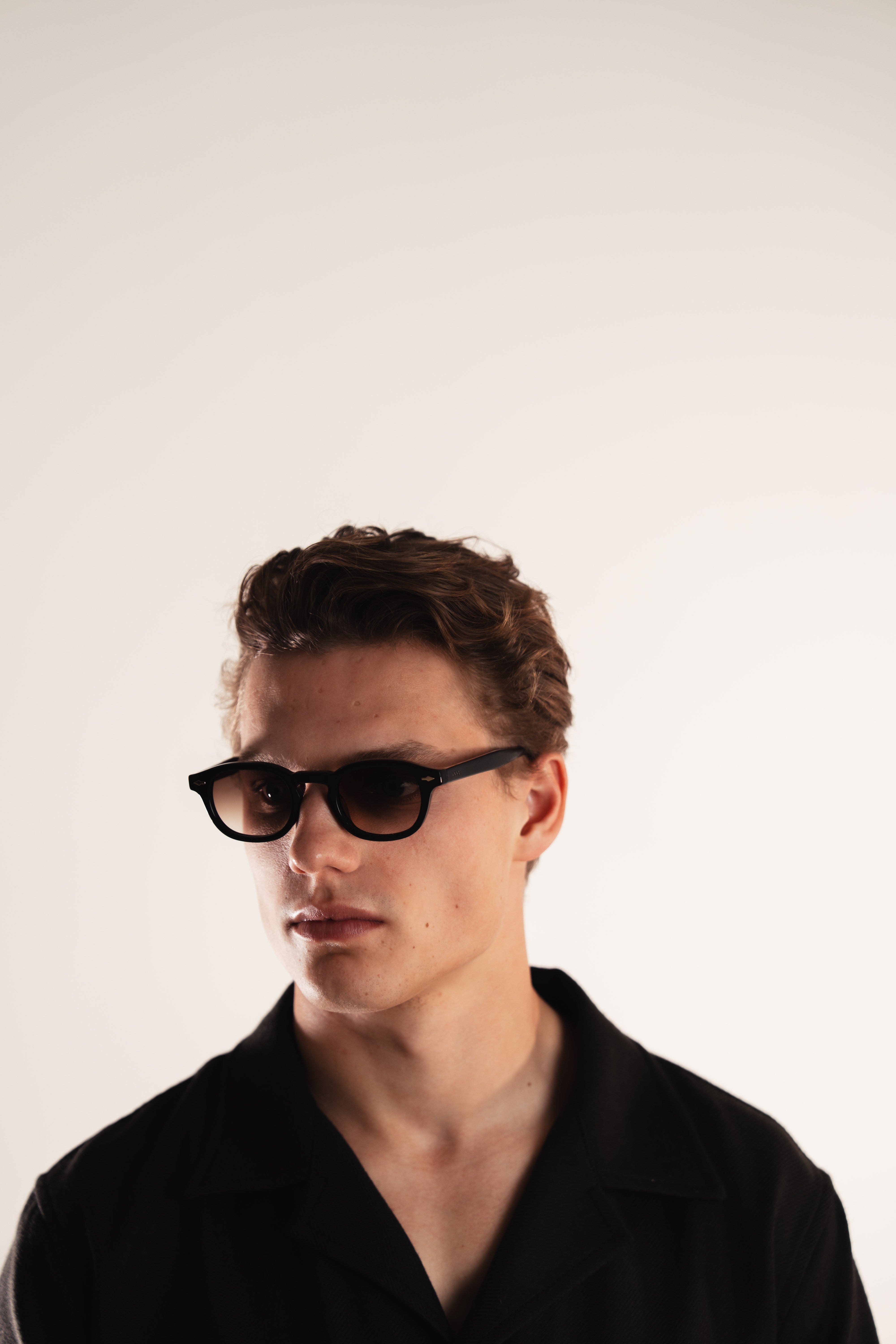 Kove OCCU lifestyle shot brown sunglasses warm tones