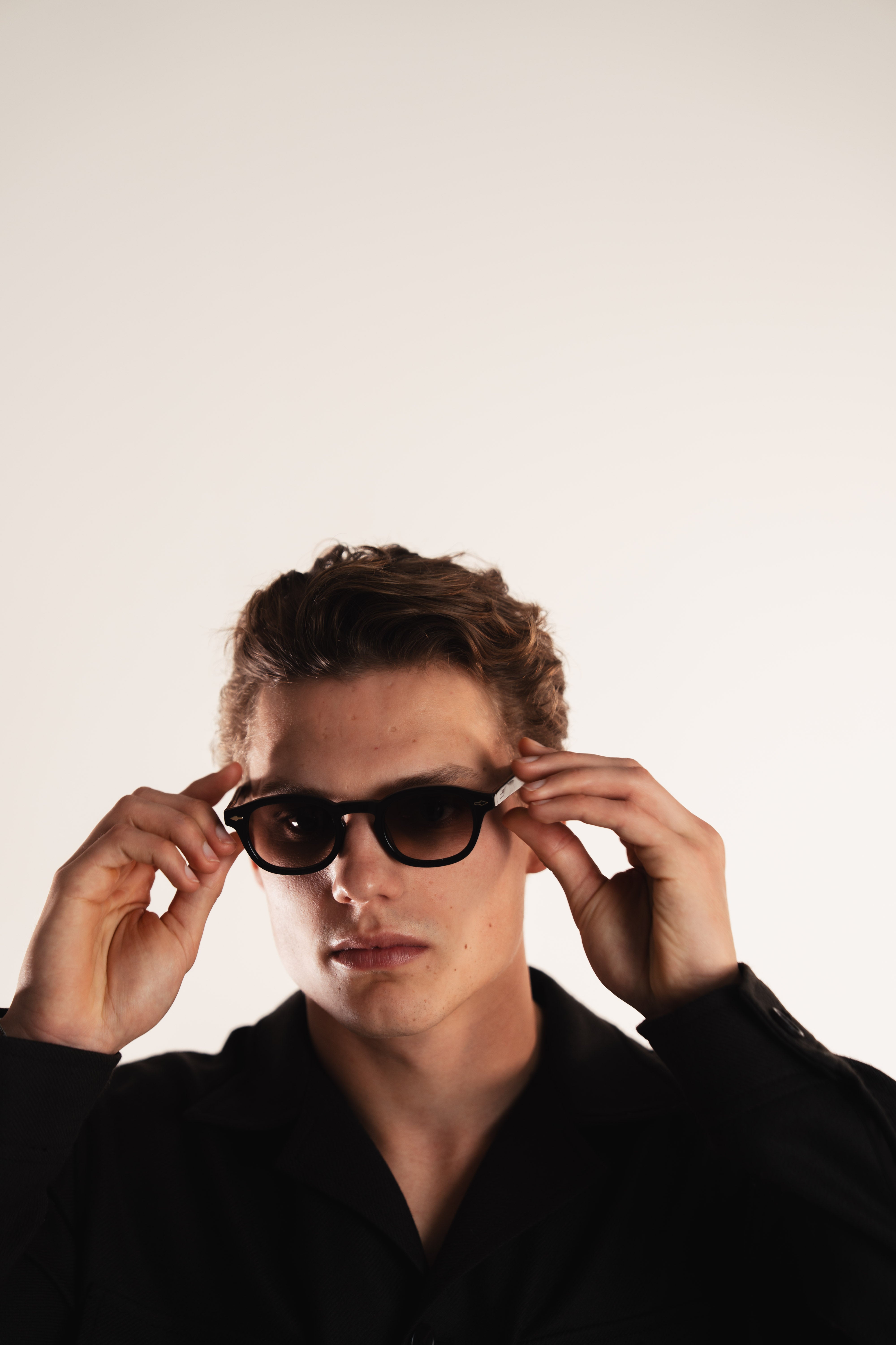 Kove OCCU premium sunglasses model wearing brown frame